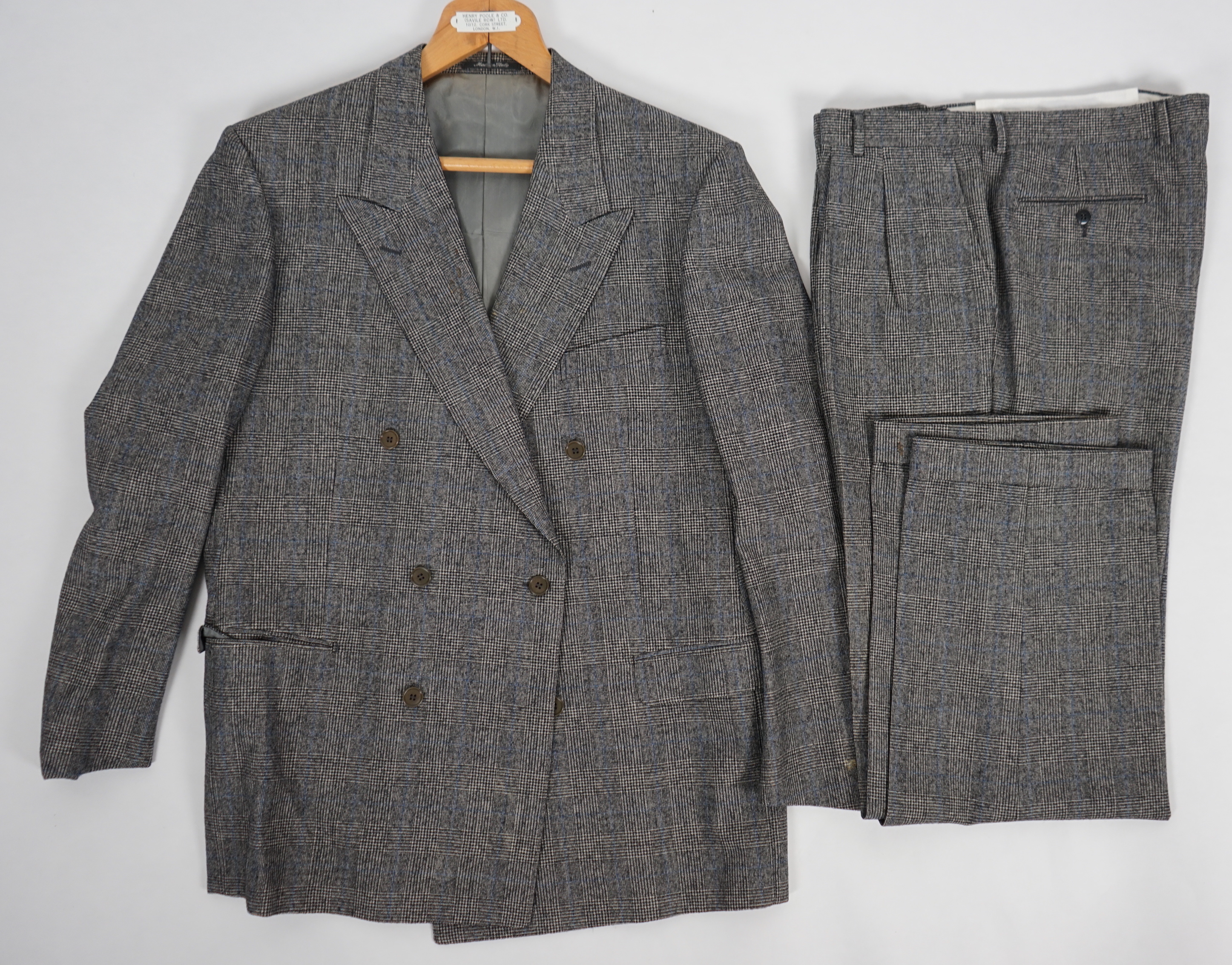 A Yves Saint Laurent rive gauche gentlemen's Prince of Wales check double breasted wool suit, approx size 42